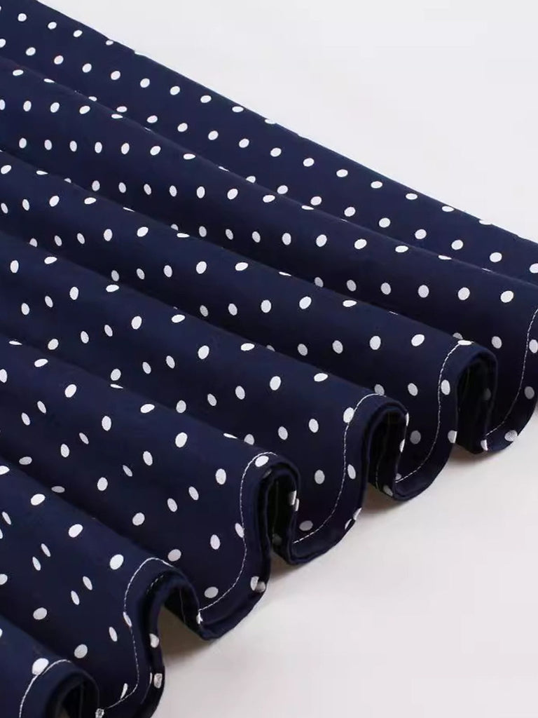 This Blue 1940s Strap Polka Dot Bow Belted Dress wraps her in 1940s elegance, one twirl at a time