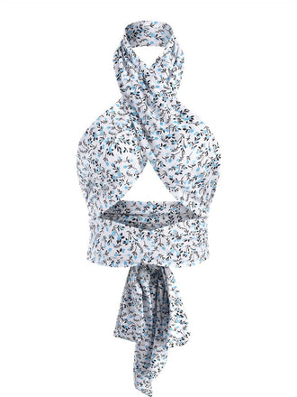 She pairs this Blue 1950s Ditsy Floral Lace-Up Crop Camisole with confidence and 1950s charm