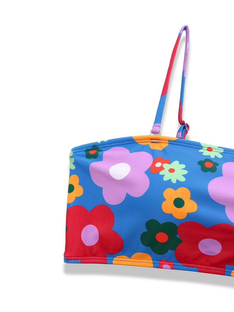 This Blue 1960s Cartoon Floral Spaghetti Straps Swimsuit carries 1960s vacation dreams in every stitch