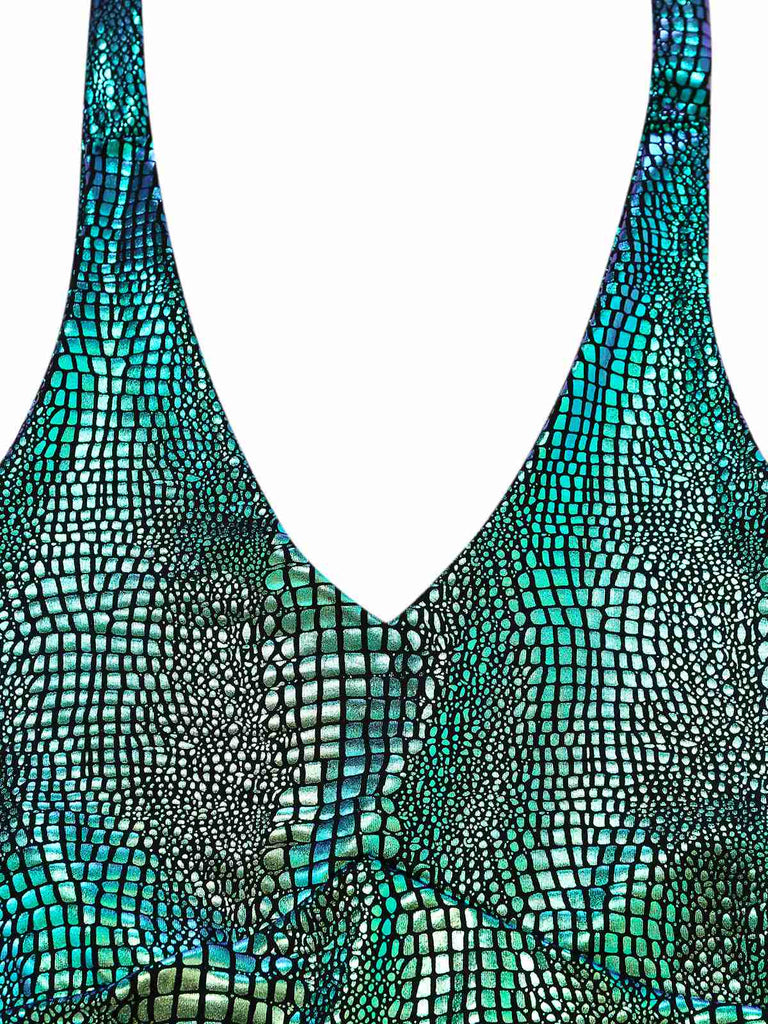 Teal and black patterned top on a white background