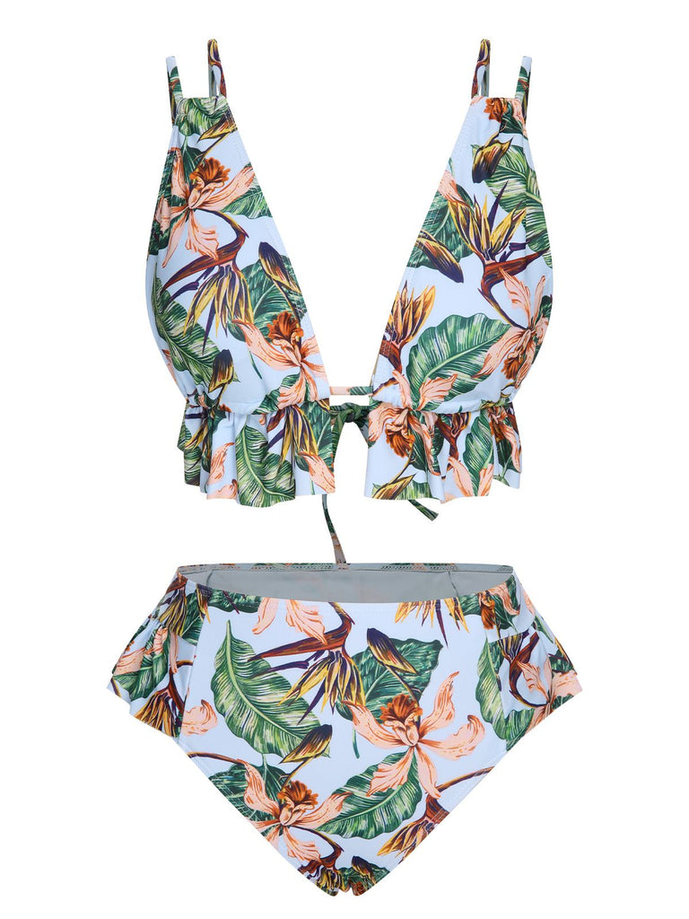 She's wearing Blue 1960s Plants Back Tie Ruffles Swimsuit and the whole beach remembers the 1960s