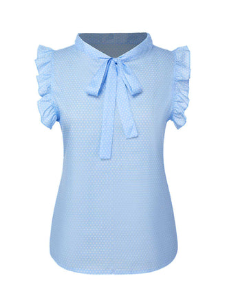 She pairs this Blue 1960s Tie Neck Polka Dots Ruffles Blouse with confidence and 1960s charm