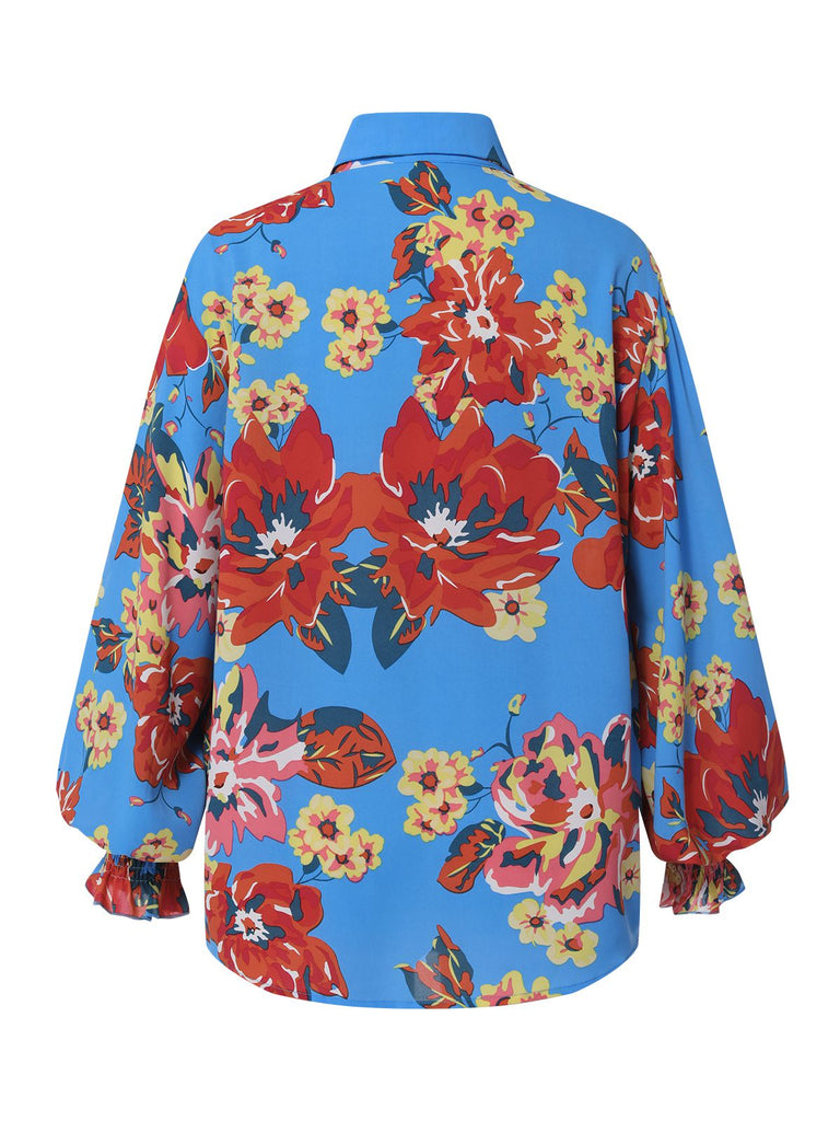 This Blue 1970s Contrast Floral Bishop Sleeve Blouse brings 1970s soul to her everyday