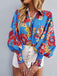 This Blue 1970s Contrast Floral Bishop Sleeve Blouse brings 1970s soul to her everyday