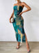 This Blue 1970s Psychedelic Print Bandeau Bodycon Dress wraps her in 1970s elegance, one twirl at a time