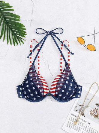 She's wearing Blue & Red 1950s Stars & Stripes Bikini Top and the whole beach remembers the 1950s