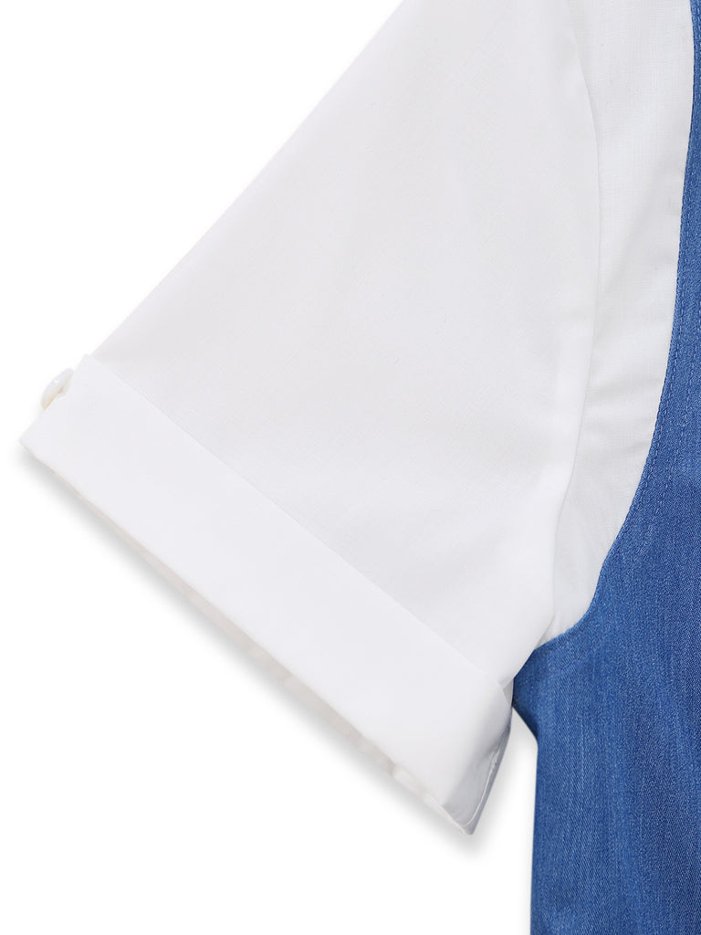 Close-up of a white shirt with blue trim on a white background