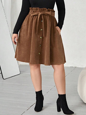 She sways in this Brown 1950s Corduroy Buttoned Skirt With Belt and it's pure 1950s magic