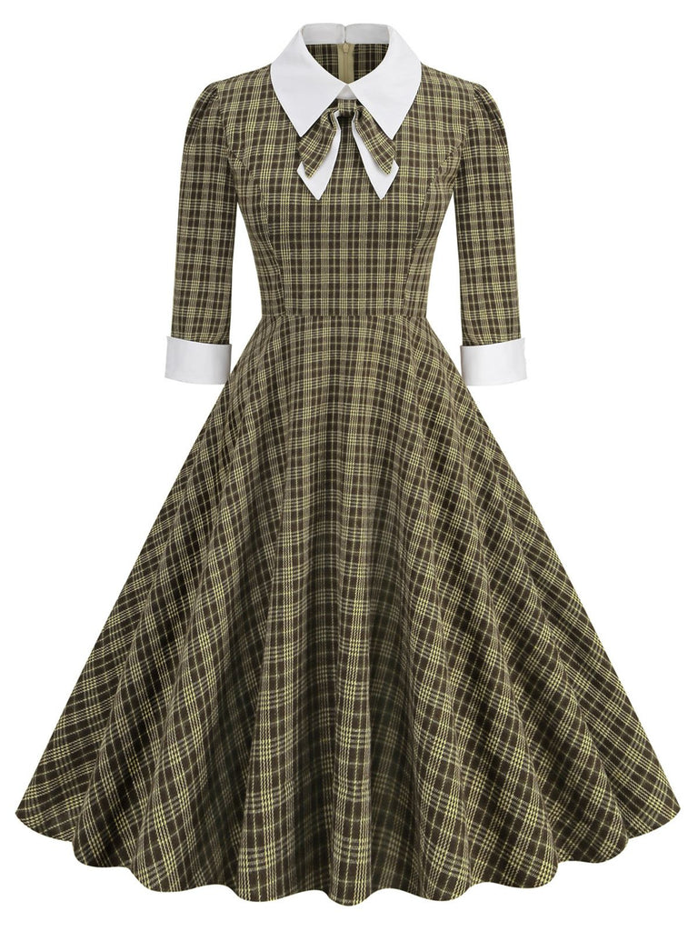 She slips into this Brown 1950s Lapel Bow Decor Plaids Dress and suddenly it's a 1950s daydream