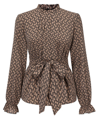She pairs this Brown 1950s Ruffles Tie Waist Blouse with confidence and 1950s charm