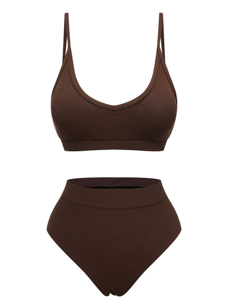 She's wearing Brown 1950s Spaghetti Strap Solid Swimsuit and the whole beach remembers the 1950s