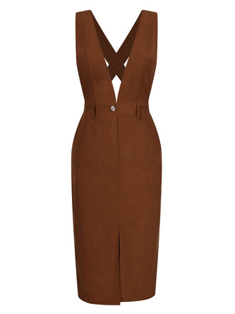 She slips into this Brown 1960s V-Neck Cross-Back Pinafore Dress and suddenly it's a 1960s daydream