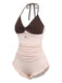 Two-tone swimsuit with brown top and beige bottom on a white background