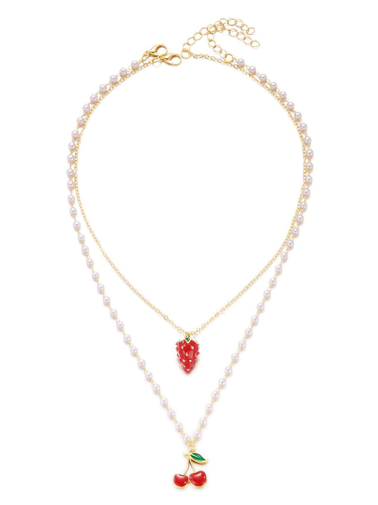 Necklace with cherry and strawberry pendants on a white background