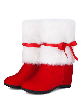 She finds her vintage story in this Christmas Patchwork Fur Bow Boots