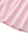 Close-up of pink fabric with a subtle pattern on a white background