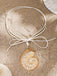 She adds this Conch Starfish Pendant Leather Cord Necklace and suddenly it's vintage perfection
