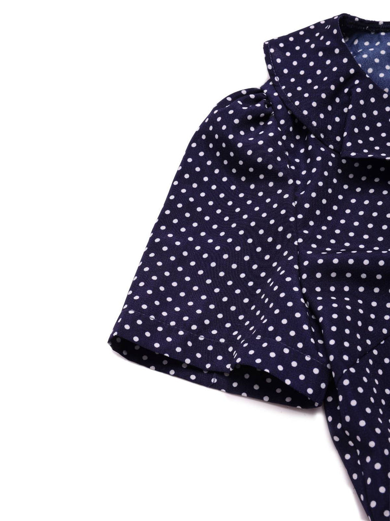 Navy blue fabric with white polka dots on a white background
