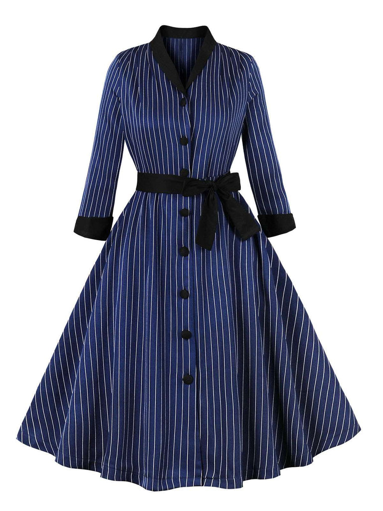 She slips into this Dark Blue 1950s Striped Patchwork Belted Dress and suddenly it's a 1950s daydream