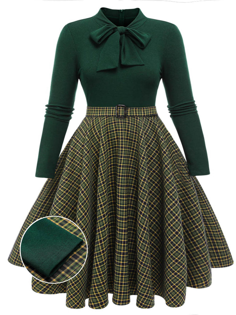 She slips into this Dark Green 1950s Plaid Knitting Dress and suddenly it's a 1950s daydream