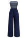She finds her 1950s story in this Deep Blue 1950s Stripes Bandeau Jumpsuit
