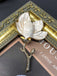 She finds her vintage story in this Enamel 3D Magnolia Flower Brooch