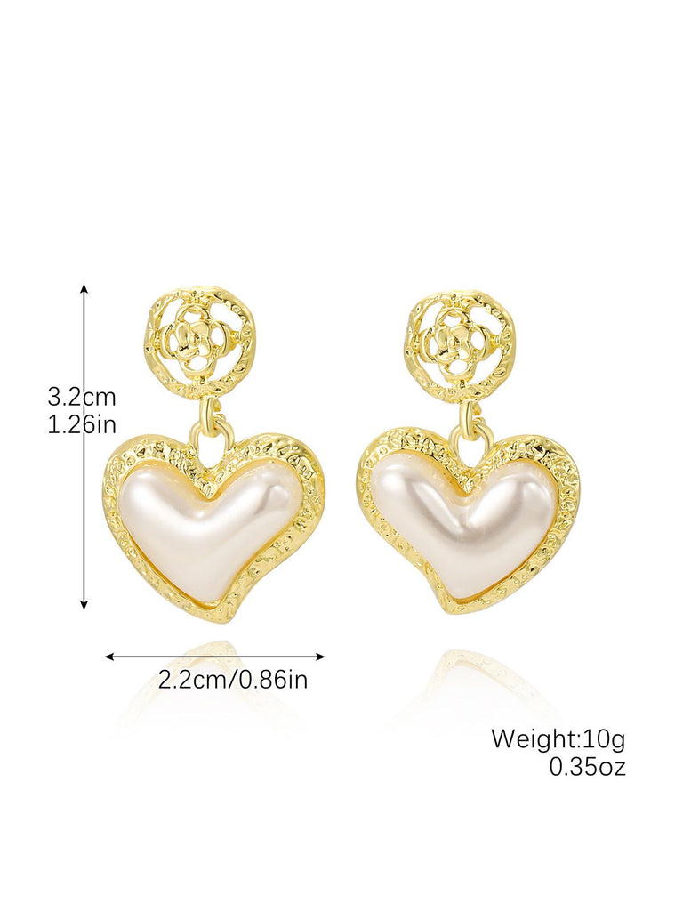 This Gold Heart Pearl Drop Earrings carries vintage stories waiting to be told