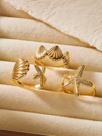 She finds her vintage story in this Gold Seashell Starfish Rings Set