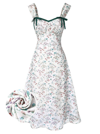 Floral dress with green straps on a white background