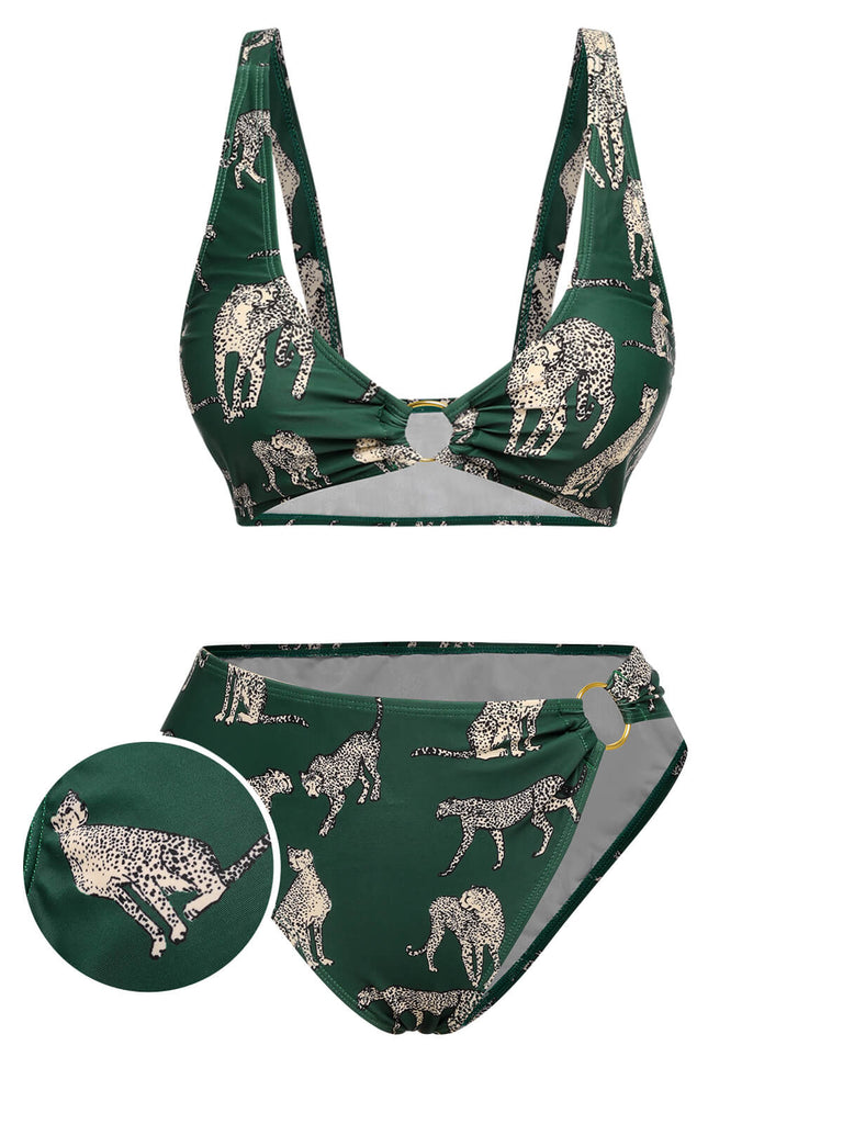 She's wearing Green 1940s Leopard Halter Split Swimsuit and the whole beach remembers the 1940s