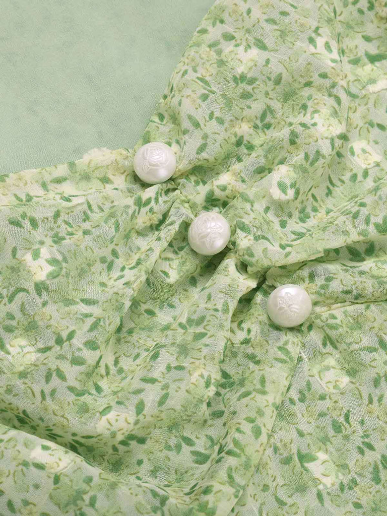 She slips into this Green 1940s Sweetheart Ditsy Floral Dress and suddenly it's a 1940s daydream