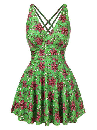 She's wearing Green 1940s V-Neck Floral Ruched-Waist Swimsuit and the whole beach remembers the 1940s