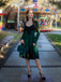 She slips into this Green 1950s Lace Patchwork Swing Dress and suddenly it's a 1950s daydream