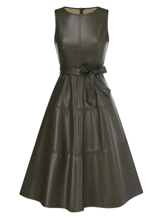 She slips into this Green 1950s Leather Sleeveless Belted Dress and suddenly it's a 1950s daydream
