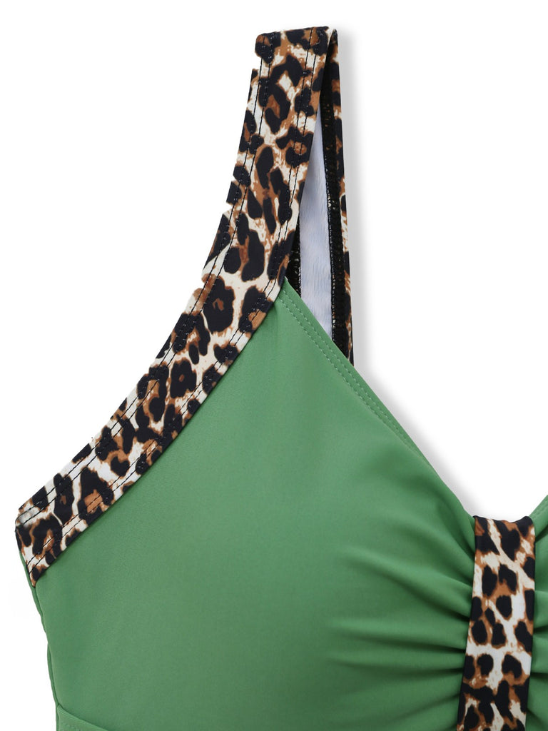 Green 1950s vintage leopard print swimsuit suspender details showcasing adjustable straps and retro hardware design ideal for authentic pin-up poolside looks