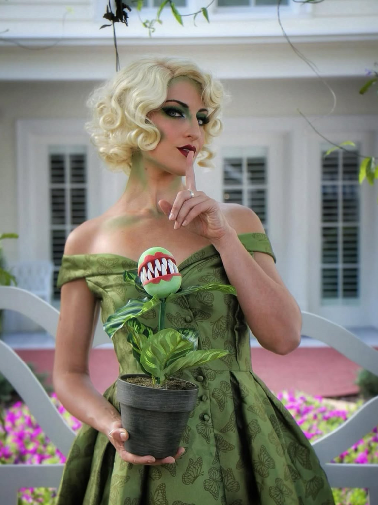 She slips into this Green 1950s Off-Shoulder Vintage Dress and suddenly it's a 1950s daydream