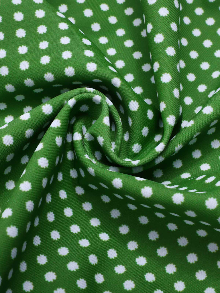 Green 1950s Polka Dots Bow Swimsuit — because 1950s glamour never goes out of style
