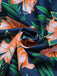 She's wearing Green 1950s Spaghetti Strap Floral Swimsuit and the whole beach remembers the 1950s