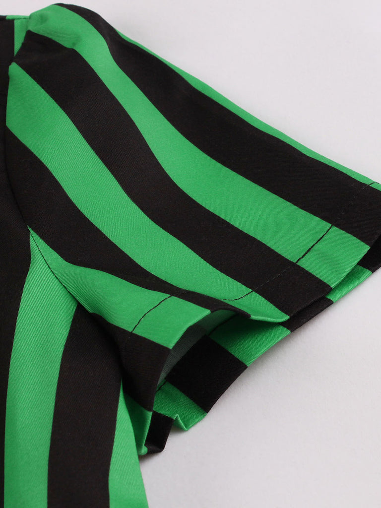 This Green 1950s Tie Neck Button Black Stripes Dress wraps her in 1950s elegance, one twirl at a time