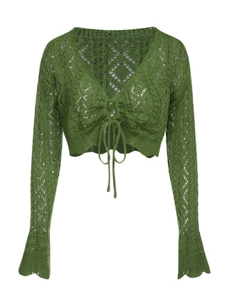 She finds her 1960s story in this Green 1960s Cutout Strappy Crochet Cover-Up