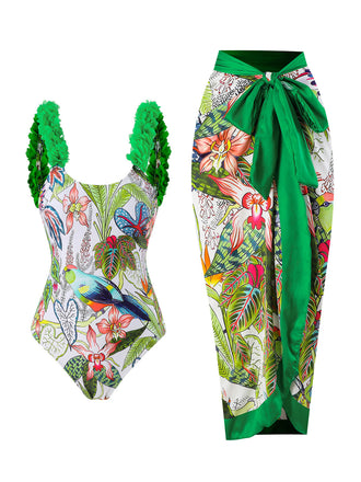 She's wearing Green 1960s Floral Bird Swimsuit & Cover-Up and the whole beach remembers the 1960s