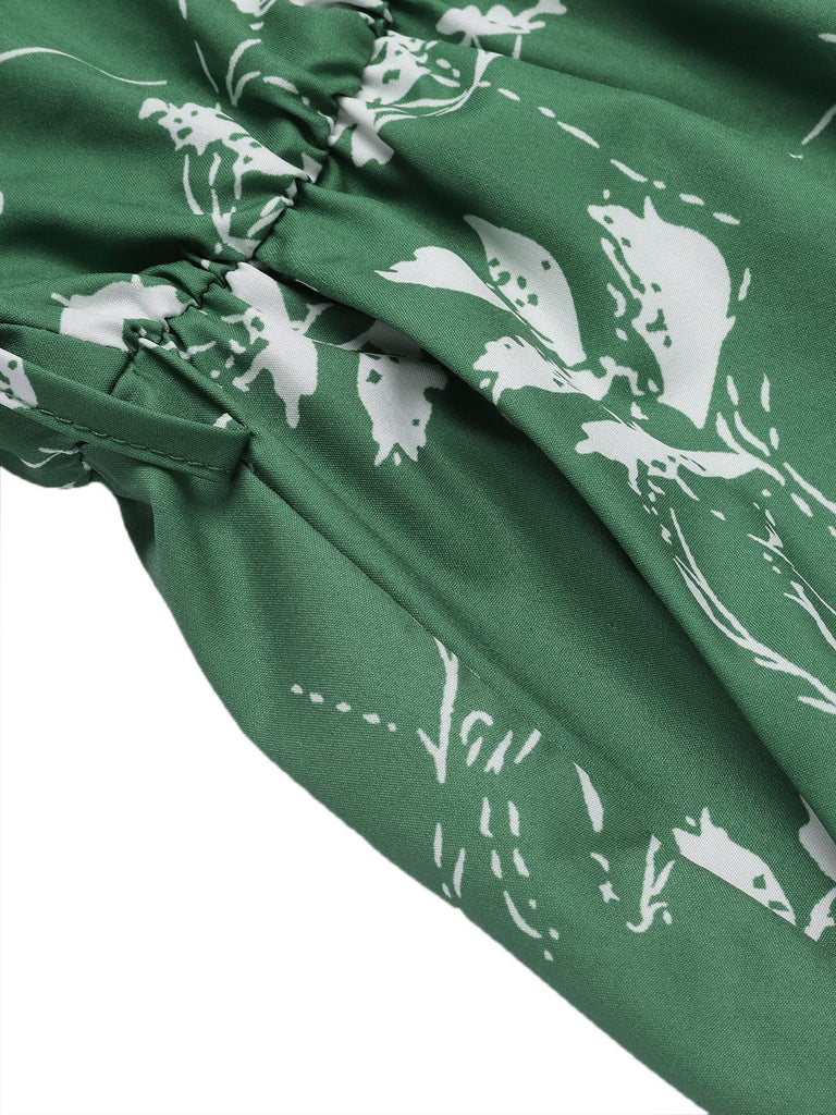Green 1960s Halter Plants Belted Romper — 1960s elegance in the palm of her hand