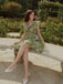 She slips into this Green 1960s Oil-Painting Rose Dress and suddenly it's a 1960s daydream