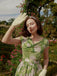 Green 1960s Oil-Painting Rose Dress: where 1960s romance meets her modern spirit