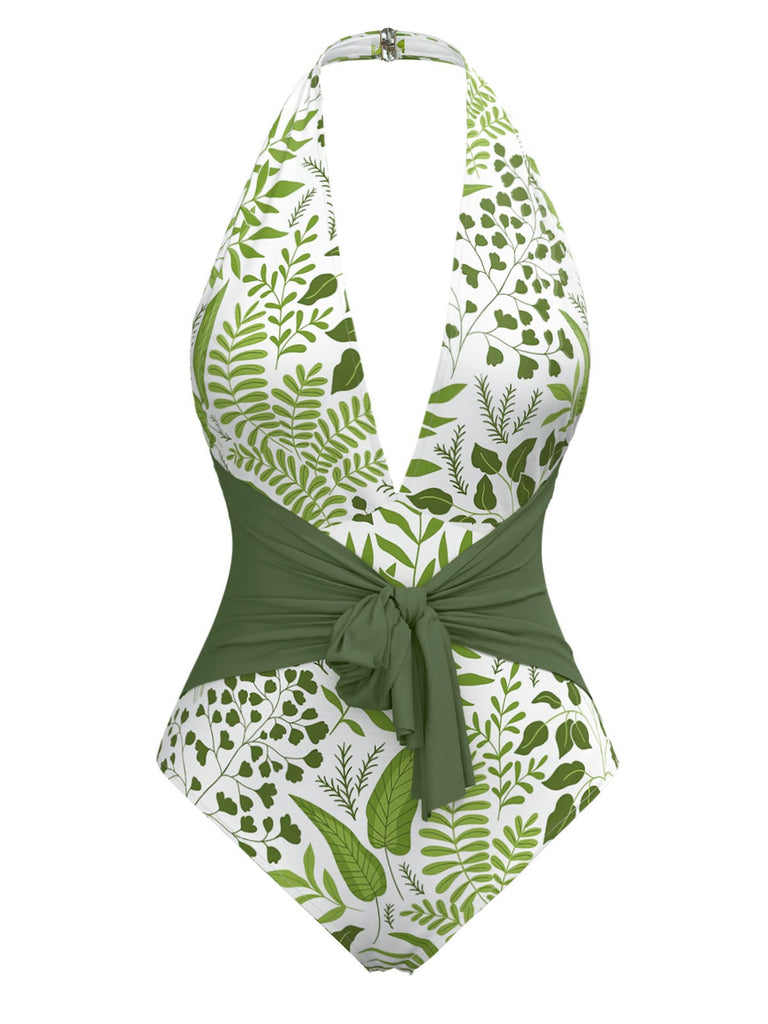 She's wearing Green 1960s Plant Print Halter One-Piece Swimsuit and the whole beach remembers the 1960s