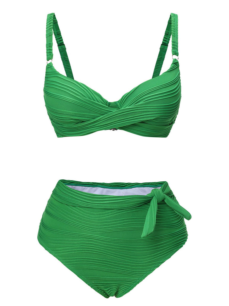She's wearing Green 1960s Pleated Solid Swimsuit and the whole beach remembers the 1960s