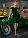 She slips into this Green 1960s Sequins Off-Shoulder Pencil Dress and suddenly it's a 1960s daydream