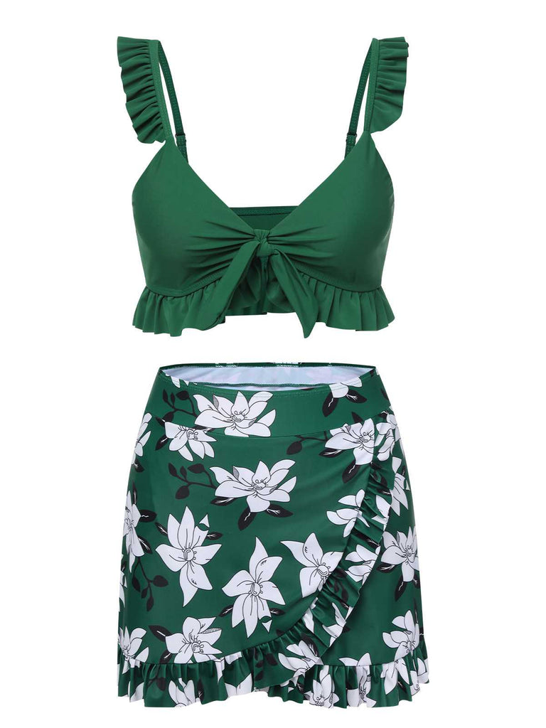 She's wearing Green 1960s Strap Floral Ruffles Swimsuit and the whole beach remembers the 1960s