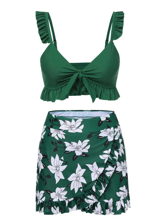 She's wearing Green 1960s Strap Floral Ruffles Swimsuit and the whole beach remembers the 1960s