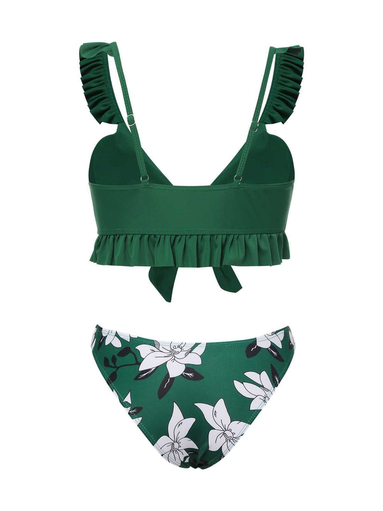 She's wearing Green 1960s Strap Floral Ruffles Swimsuit and the whole beach remembers the 1960s
